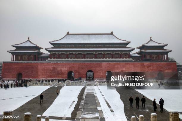 General view of the Forbidden City, where French Prime Minister Bernard Cazeneuve is scheduled to visit, after a snowfall in Beijing on February 22,...