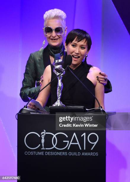 Costume designers Lou Eyrich and Helen Huang accept the Outstanding Contemporary Television Series award for 'American Horror Story' onstage at The...