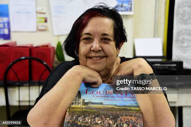 Rosa Magalhaes, responsible for the Sao Clemente samba school's carnival performance -which this year will be about France- smiles during an...