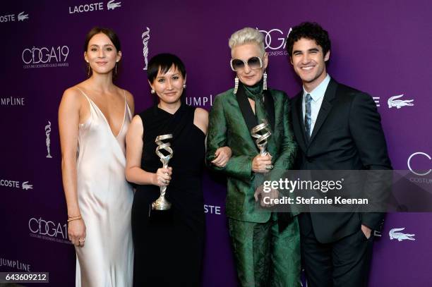 Actors Troian Bellisario and Darren Criss pose with costume designers Helen Huang and Lou Eyrich , winners of the Outstanding Contemporary Television...