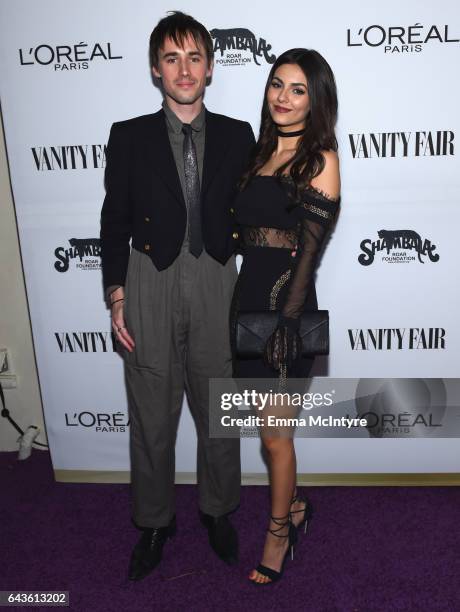 Musician Reeve Carney and actor Victoria Justice attend Vanity Fair and L'Oreal Paris Toast to Young Hollywood hosted by Dakota Johnson and Krista...