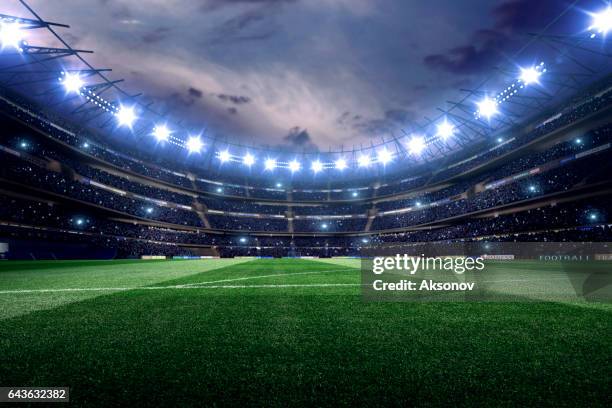 dramatische voetbalstadion - football pitch stockfoto's en -beelden