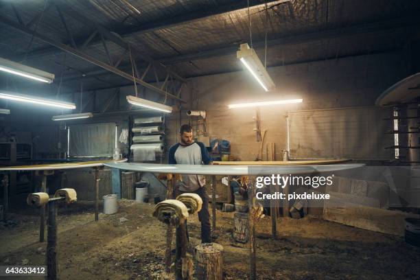 making sure it's just right - surfboard maker stock pictures, royalty-free photos & images