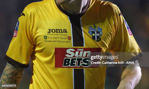 Detail on the shirt of Sutton United with the match fixture and Sun Bets sponsor during The Emirates FA Cup Fifth Round match between Sutton United...