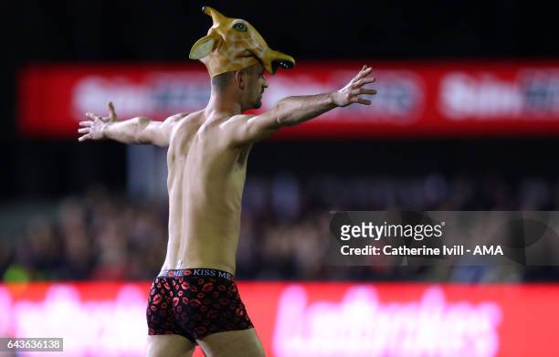 Streaker wearing a giraffe hat runs onto the pitch during The Emirates FA Cup Fifth Round match between Sutton United and Arsenal on February 20,...