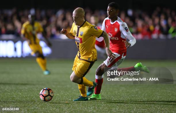 Nicky Bailey of Sutton United and Jeff Reine-Adelaide of Arsenal during The Emirates FA Cup Fifth Round match between Sutton United and Arsenal on...