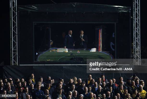 Alan Shearer and Gary Lineker watch from the tv studio during The Emirates FA Cup Fifth Round match between Sutton United and Arsenal on February 20,...