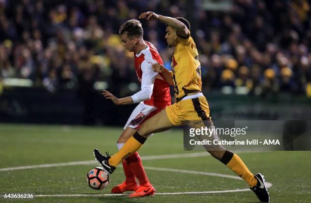 Rob Holding of Arsenal and Maxime Biamou of Sutton United during The Emirates FA Cup Fifth Round match between Sutton United and Arsenal on February...