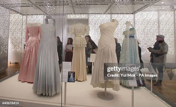 Blue silk chiffon evening gown worn by the Princess of Wales to the Cannes Film Festival in 1987 and a white silk chiffon gown trimmed with sequins...