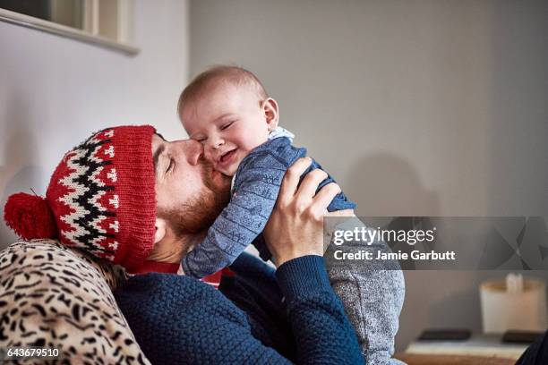 portrait of a parent and child bonding - baby beard stock-fotos und bilder