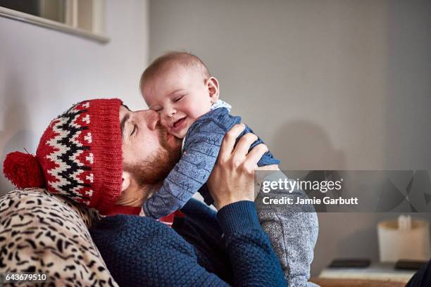 portrait of a parent and child bonding - father and baby stock pictures, royalty-free photos & images