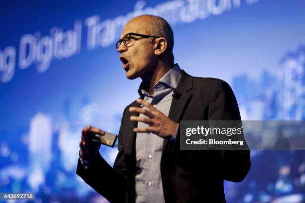 Satya Nadella, chief executive officer of Microsoft Corp., gestures as he speaks during the Microsoft Decoded conference in Mumbai, India, on...