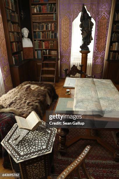 The original, furnished library of 19th-century German writer Karl May, which includes many travel guides and accounts that served May with...