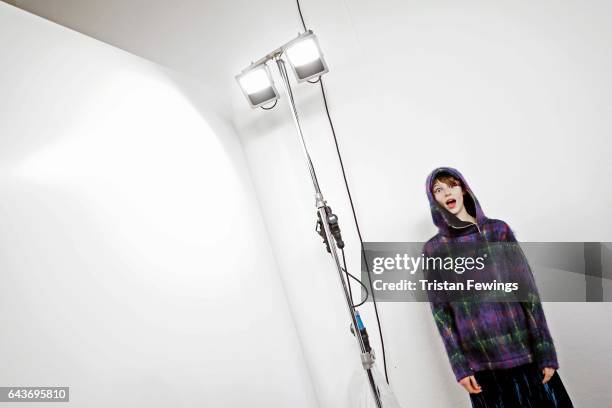 Model is seen backstage ahead of the Wunderkind show during Milan Fashion Week Fall/Winter 2017/18 on February 22, 2017 in Milan, Italy.