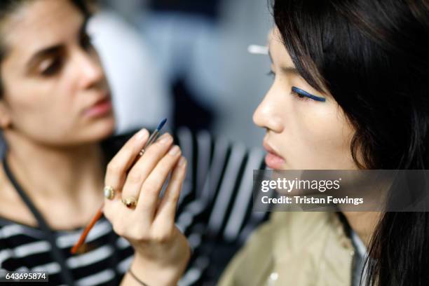 Model is seen backstage ahead of the Wunderkind show during Milan Fashion Week Fall/Winter 2017/18 on February 22, 2017 in Milan, Italy.