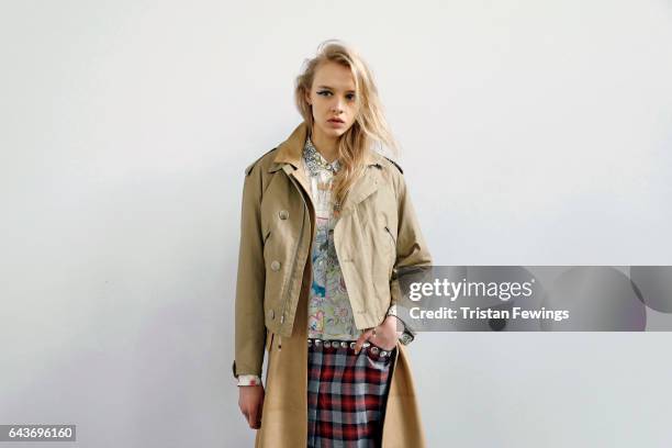 Model is seen backstage ahead of the Wunderkind show during Milan Fashion Week Fall/Winter 2017/18 on February 22, 2017 in Milan, Italy.