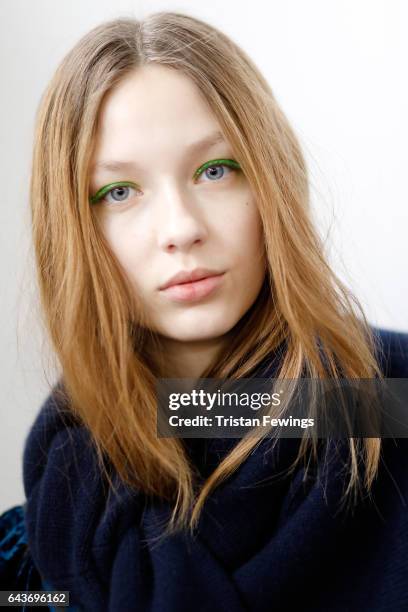 Model is seen backstage ahead of the Wunderkind show during Milan Fashion Week Fall/Winter 2017/18 on February 22, 2017 in Milan, Italy.