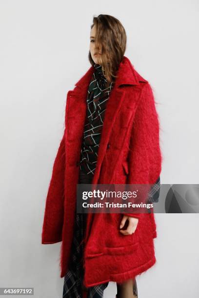 Model is seen backstage ahead of the Wunderkind show during Milan Fashion Week Fall/Winter 2017/18 on February 22, 2017 in Milan, Italy.