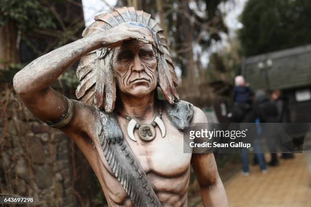 Statue of an American Indian stands in front of the Karl May Museum, which is also the former residence of 19th-century German writer Karl May, as...