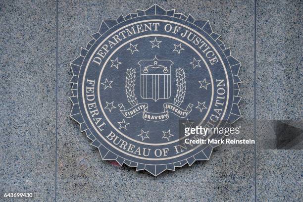 Close-up of the seal of the Federal Bureau of Investigation of the wall of J Edgar Hoover FBI Building, Washington DC, January 21, 2017.