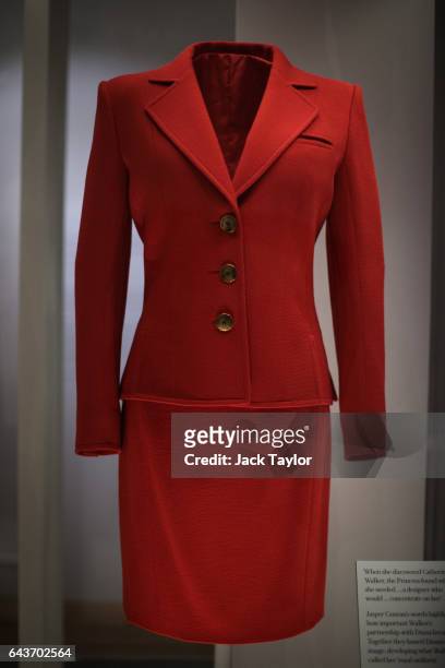 Catherine Walker red day suit worn by Princess Diana at the launch of the HIV / Aids charity London Lighthouse appeal on display at a press preview...
