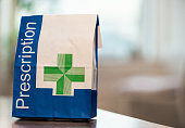 Prescription medicine in a paper bag
