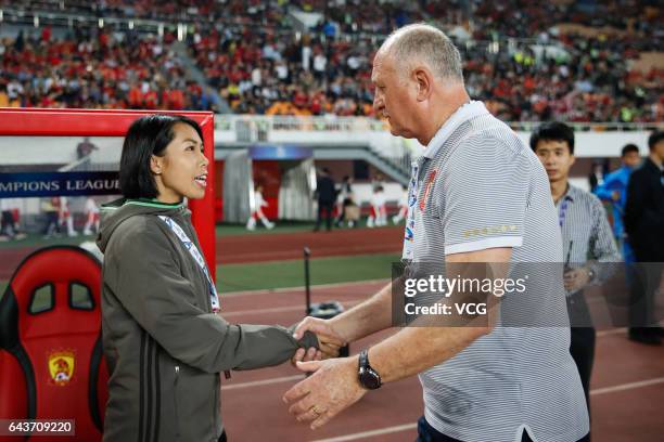 Manager Luiz Felipe Scolari of Guangzhou Evergrande shakes hands with coach Chan Yuen-ting of Eastern during 2017 AFC Asian Champions League group...