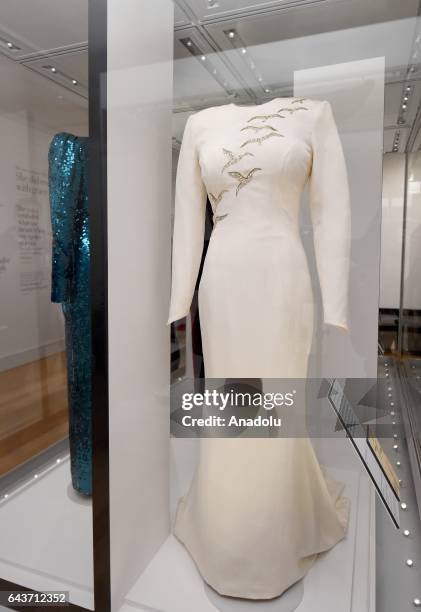Catherine Walker Cream silk crepe dress embroidered with sequins worn on an official visit to Saudi Arabia during a preview from 'Diana: Her Fashion...