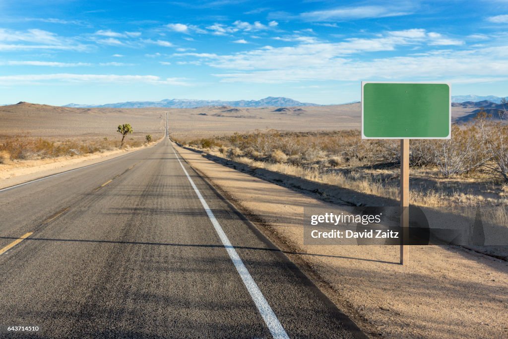 Blank sign on desert highway PC RM