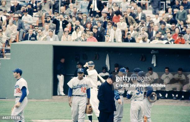 Manager Walter Alston, catcher John Roseboro, Maury Wills of the Los Angeles Dodgers argue with home plate umpire Tom Gorman as pitcher Sandy Koufax...