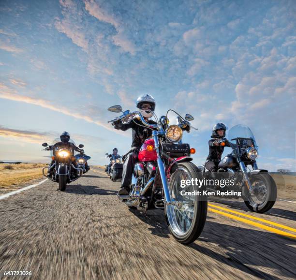 group of women motorcyclists - motorbike stock pictures, royalty-free photos & images