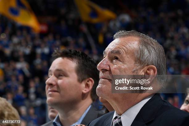 Bob Plager and his family watch as Plager's number is hung in the rafters during Plager's number retirement ceremony prior to a game between the...