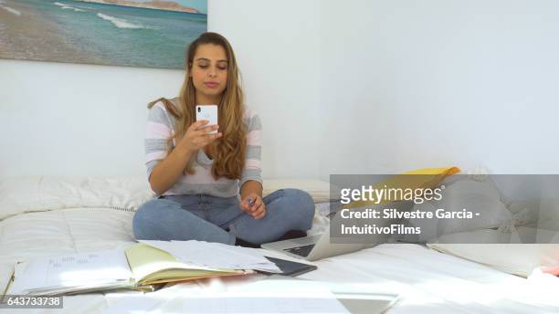 beautiful woman making a phone call - estudando stock pictures, royalty-free photos & images