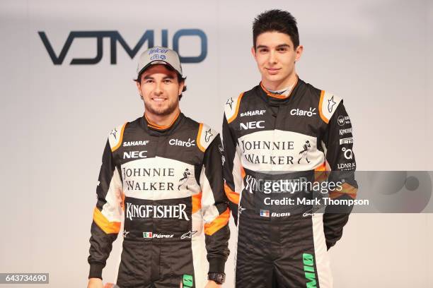 Sergio Perez of Mexico and Sahara Force India and Esteban Ocon of France and Sahara Force India pose with the VJM10 car during the Sahara Force India...