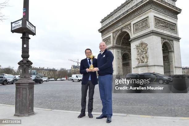 Pascal Grizot and Thomas Bjorn, European Captain for the 2018 Ryder Cup in France, poses with the Ryder Cup Trophy in front of the Arc De Triomphe on...