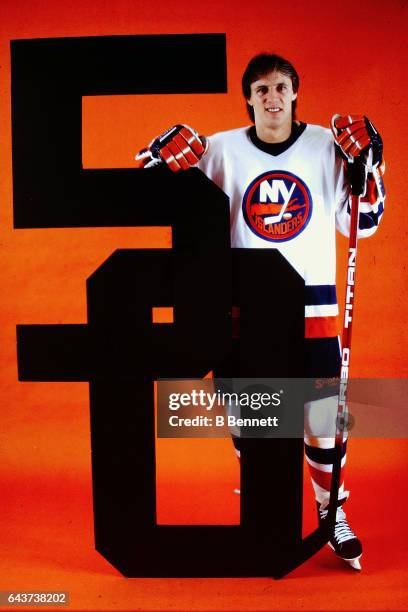 1980s: Former New York Islander Mike Bossy poses with numbers signifying his 50 goal season.