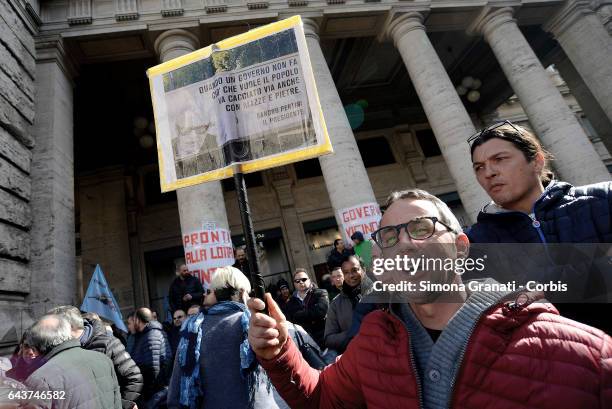 Street Vendors and taxi drivers protest against the Bolkestein Directive in front of Palazzo Chigi on February 21, 2017 in Rome, Italy.