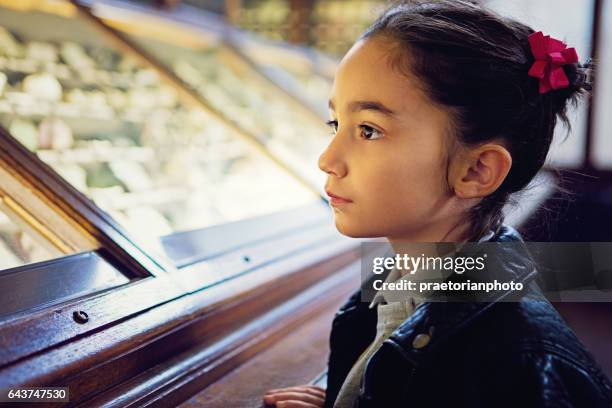 little girl is looking exhibition - museum tour stock pictures, royalty-free photos & images