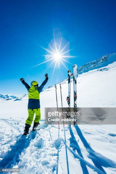 young skier with hands in the air - sölden stock pictures, royalty-free photos & images