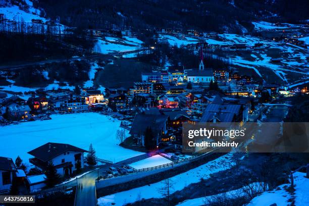 town soelden (solden), tirol, austria at dusk - sölden stock pictures, royalty-free photos & images