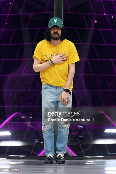 Designer Alessandro Michele aknowledge the applause of the public after the Gucci show during Milan Fashion Week Fall/Winter 2017/18 on February 22,...