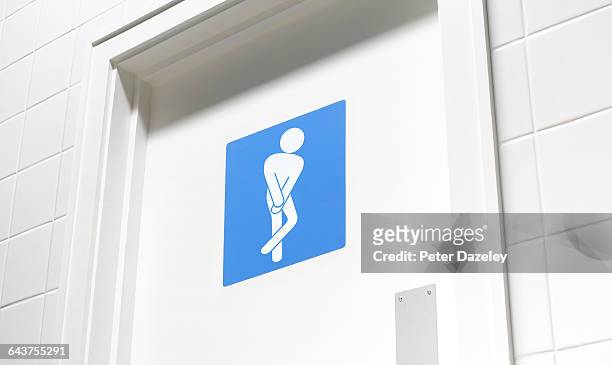 desperate toilet door sign - public bathroom stock pictures, royalty-free photos & images