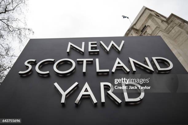 The New Scotland Yard logo is displayed on a revolving sign outside the Curtis Green Building, the new home of the Metropolitan Police on February...