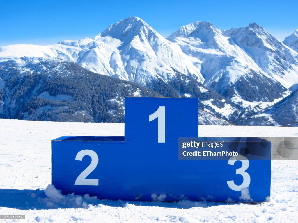 Empty winners' podium in the snow