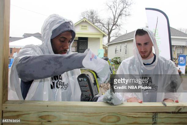 Kawhi Leonard of the San Antonio Spurs and Gordon Hayward of the Utah Jazz participates during the NBA Cares Day of Service as part of 2017 All-Star...