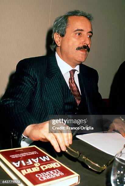 Italian judge Giovanni Falcone attends the launch of the book 'Dieci Anni di Mafia' by Saverio Lodato in October 1991 in Rome, Italy. Falcone was an...