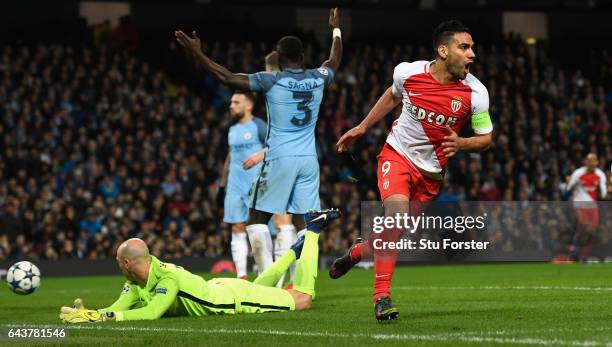 Radamel Falcao of AS Monaco celebrates the first Monaco goal past Willy Caballero during the UEFA Champions League Round of 16 first leg match...