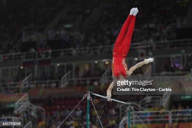 Gymnastics - Olympics: Day 3 Chenglong Zhang of China performing his Horizontal Bar routine during the Artistic Gymnastics Men's Team Final at the...