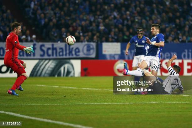 Matija Nastasic of Schalke scores an own goal against goalkeeper Ralf Faehrmann under pressure from Efthymis Koulouris of PAOK during the UEFA Europa...