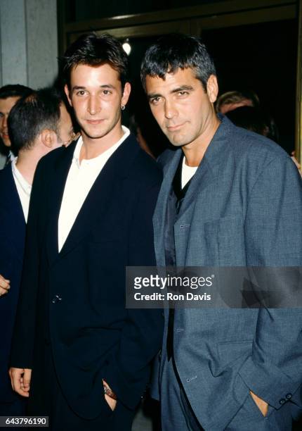 Actors Noah Wyle and George Clooney arrive before the ''Desperado'' Westwood Premiere on August 21, 1995 at the Mann's National Theater in Westwood,...